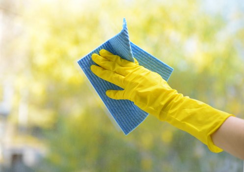 Cleaning team servicing desks and communal areas in an SW8 office