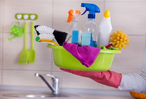 Carpet cleaning technician preparing equipment for a booked service