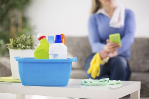 Professional carpet cleaning team working safely in SW8