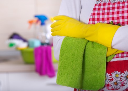 Cleaner restoring carpet freshness in SW8 living room